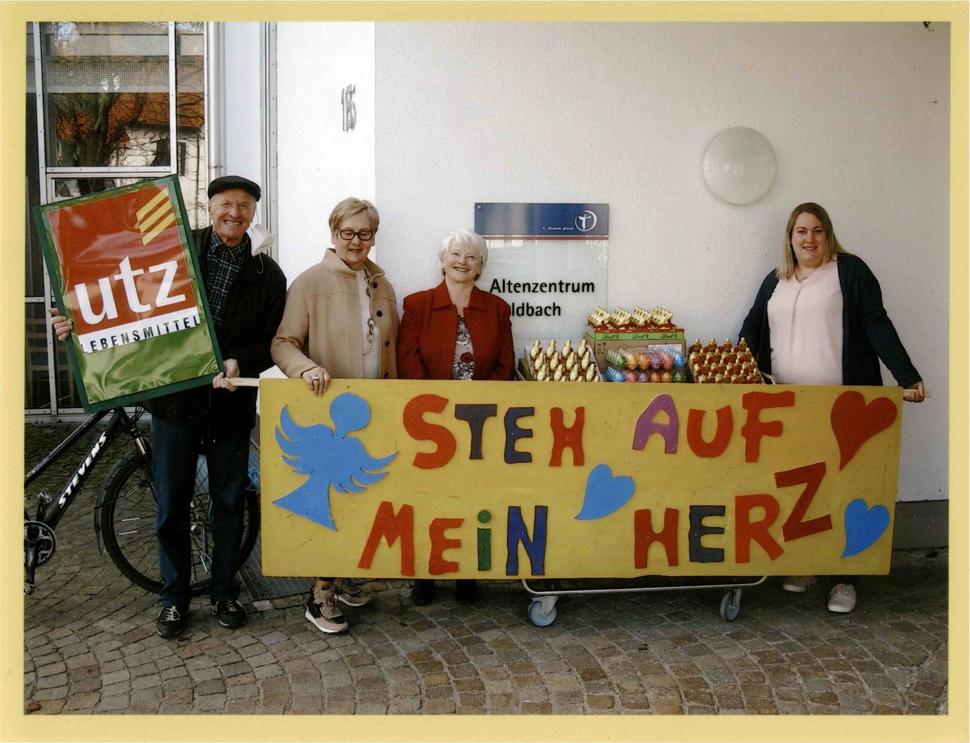 uebergabe-mit-utz-logo